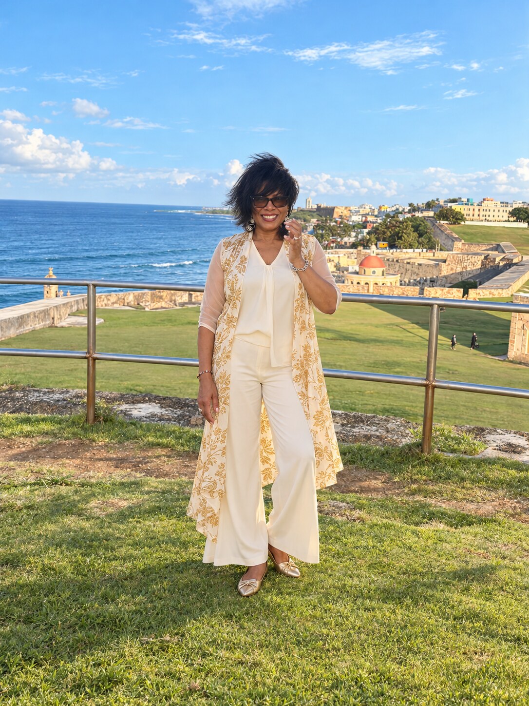 Pastor Anita representing purpose, confidence, and legacy beside the ocean